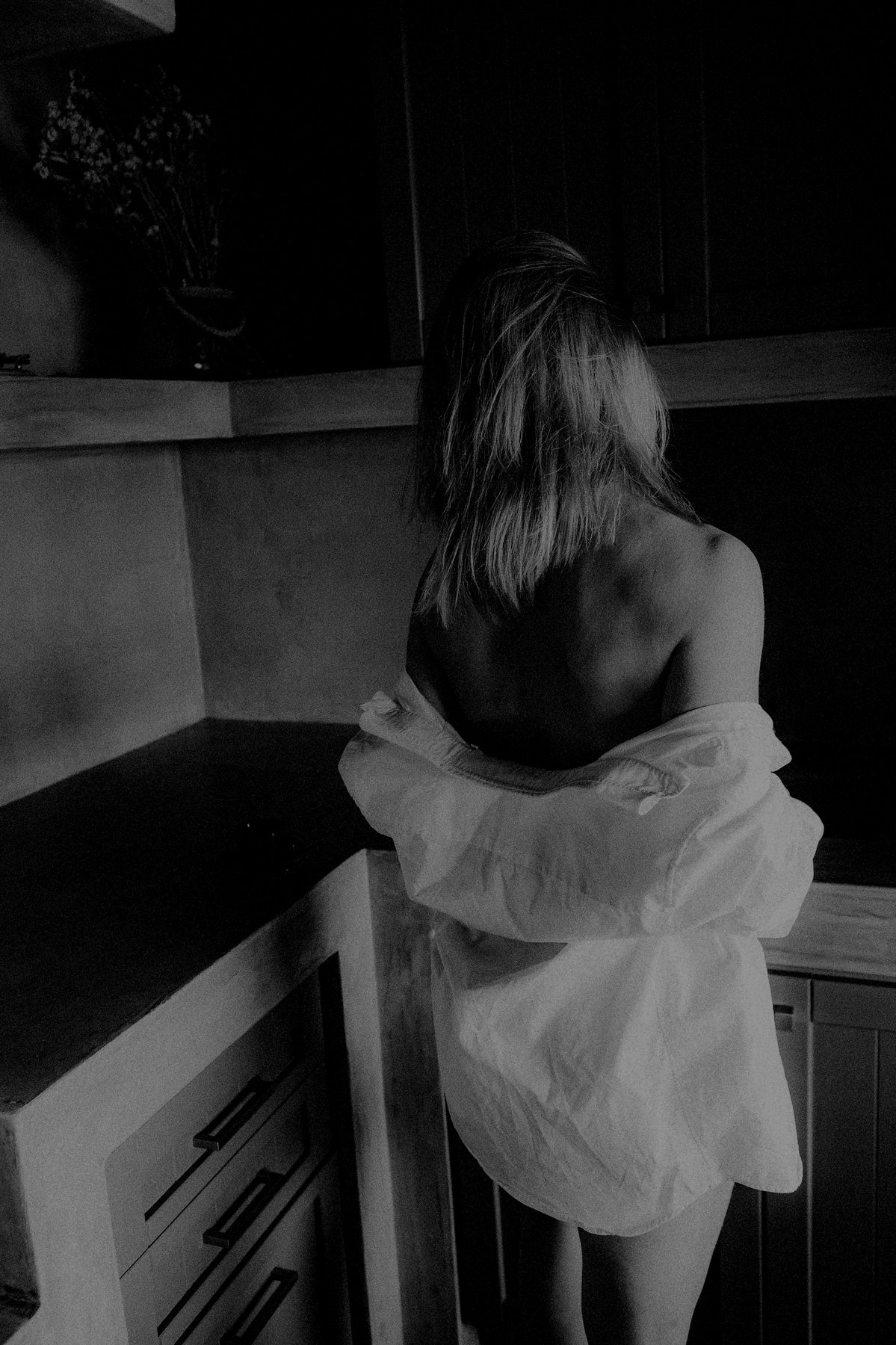 An intimate black-and-white moment from the original UNDRESSED story